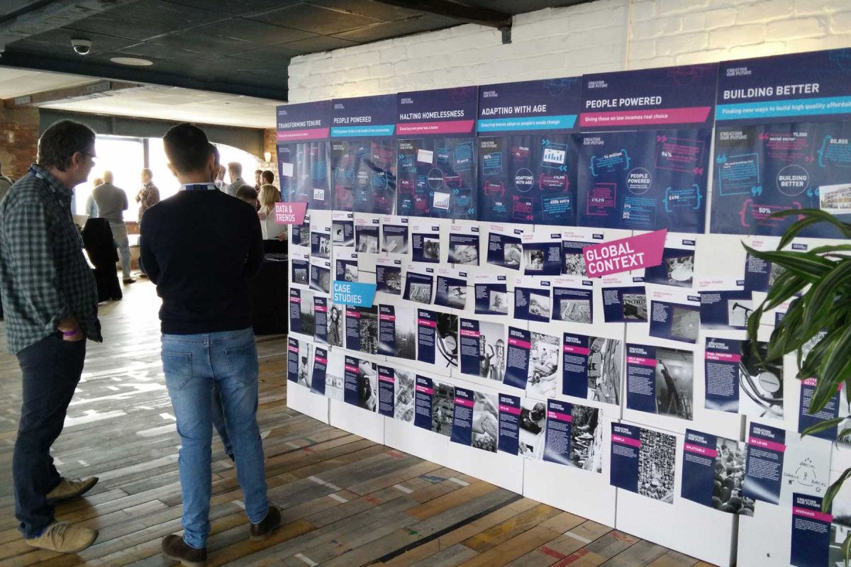 Team at exhibition about modern methods of construction